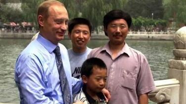 普京重逢2000年首次访华时抱过的中国男孩