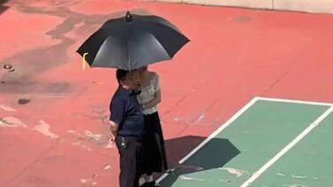 遮阳伞被恶意曲解 别让龌龊想象透支善意与温情