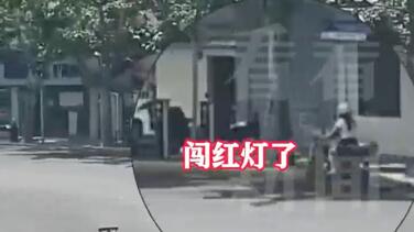法国女生在上海闯红灯 被罚50元心情却很好